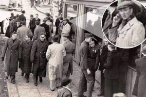 Time Traveler? A man with a mobile phone in a 1943 photograph